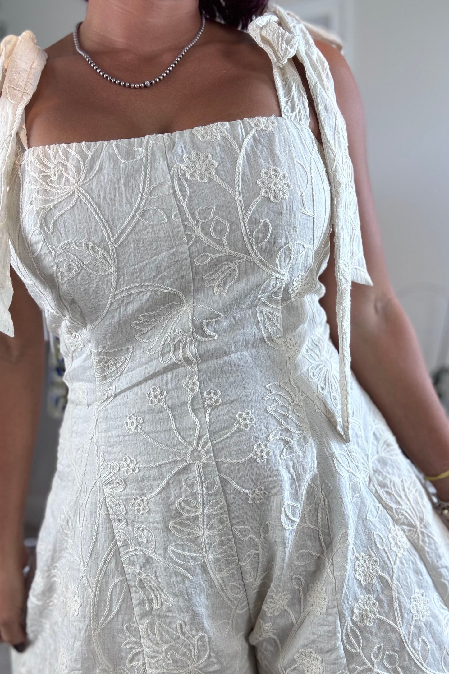 Floral embroidery ivory romper