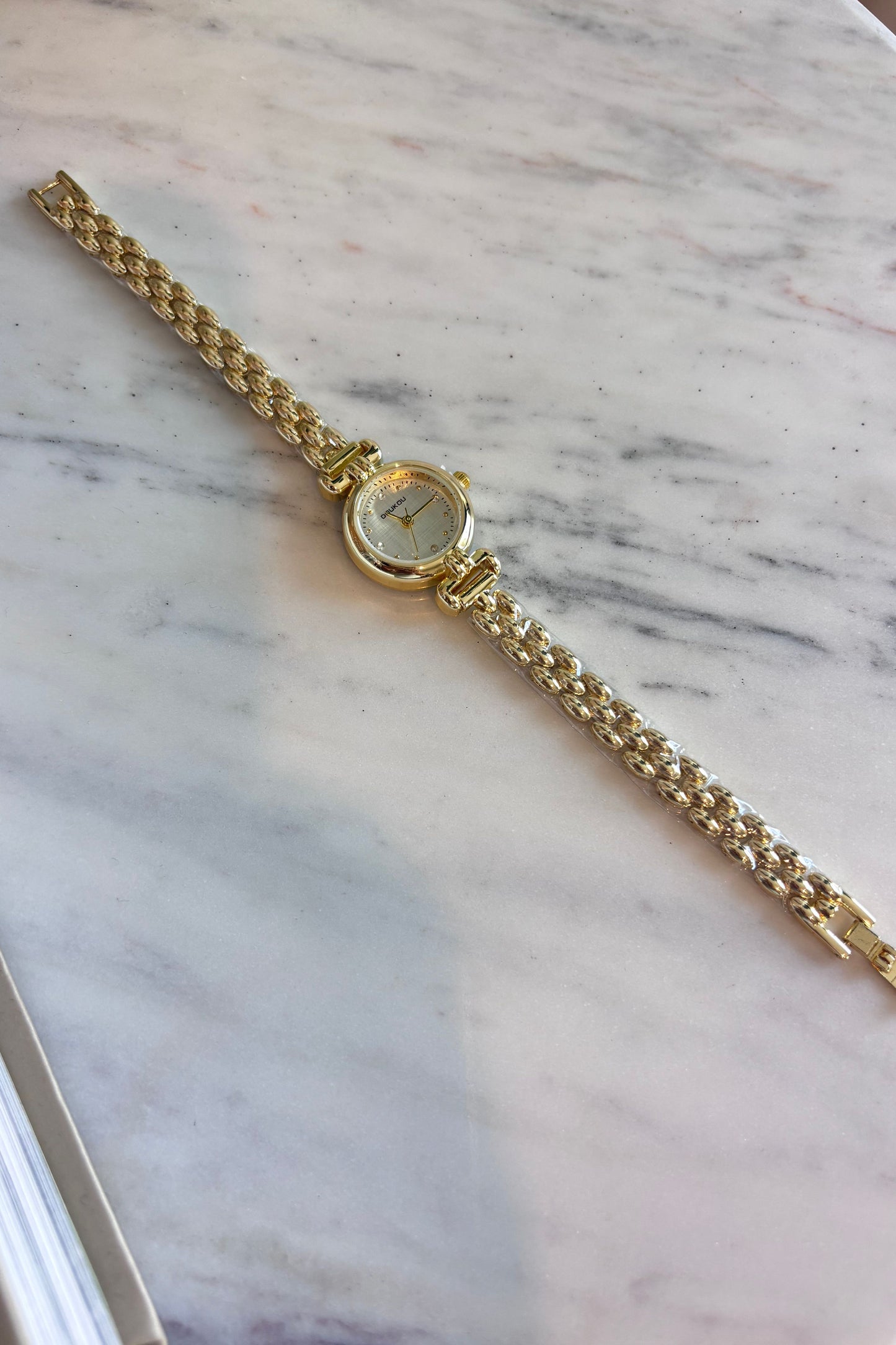 Round Gold Watch